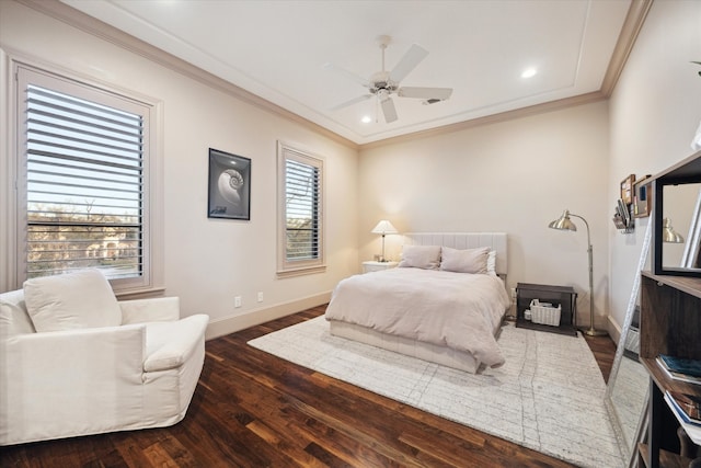 bedroom with crown molding, recessed lighting, wood finished floors, and baseboards