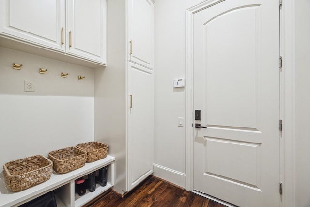 mudroom with baseboards and dark wood-style floors