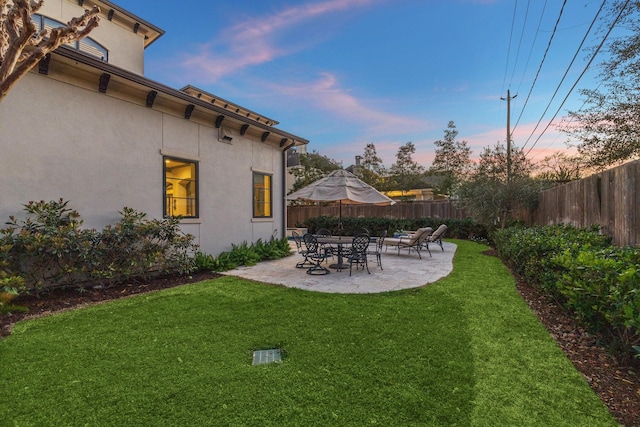 view of yard featuring a patio area and fence