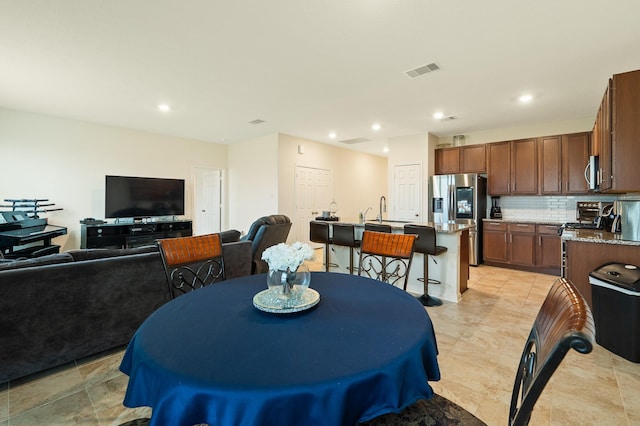 dining room featuring recessed lighting and visible vents