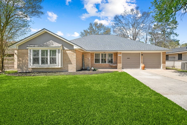 ranch-style home with a garage, brick siding, concrete driveway, and a front yard