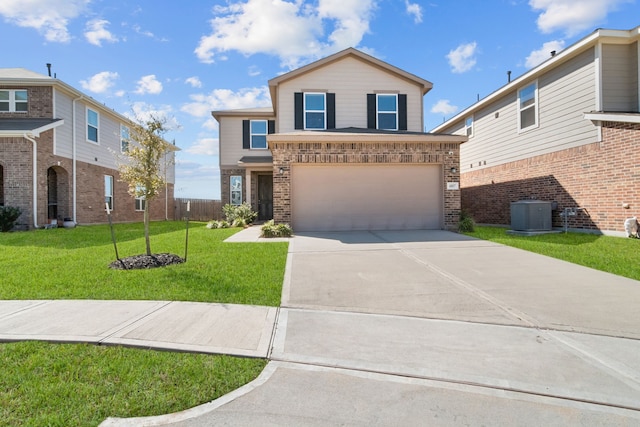 view of front of house with brick siding, a front lawn, central AC, a garage, and driveway