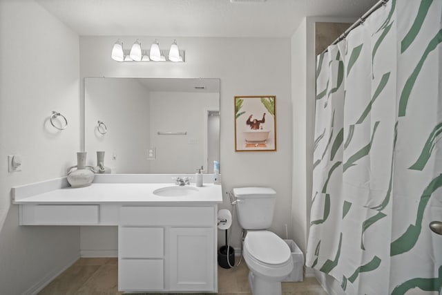 full bath featuring visible vents, baseboards, toilet, tile patterned floors, and vanity