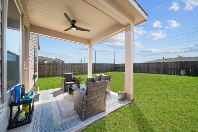 view of patio / terrace with a ceiling fan and a fenced backyard