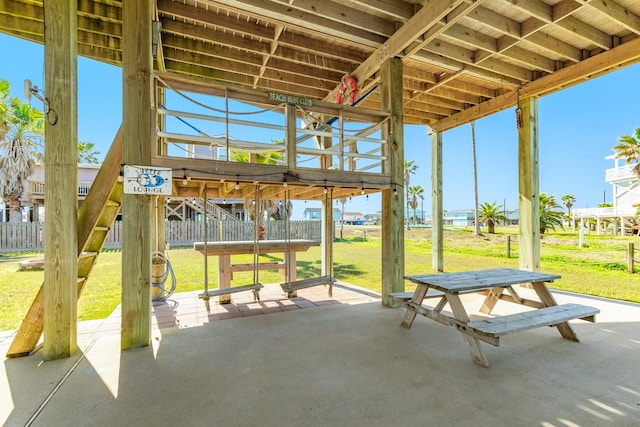 view of patio featuring fence