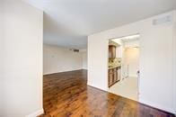 unfurnished room featuring wood finished floors