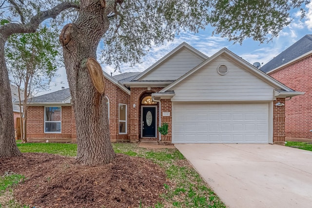 single story home with brick siding, driveway, a garage, and roof with shingles