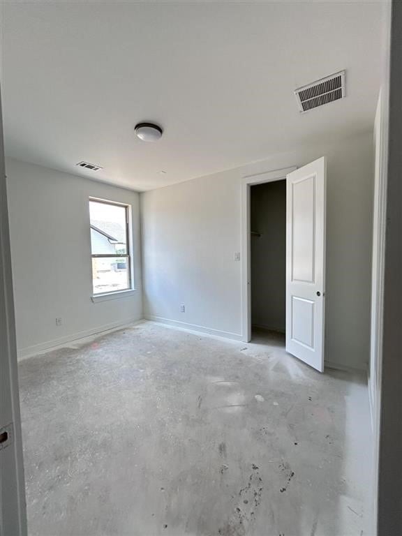 5522 Orangery, Manvel, TX 77578 - unfurnished room featuring concrete floors and baseboards