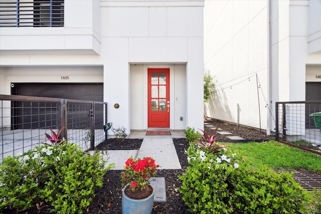 doorway to property with fence