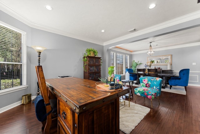 office space featuring dark wood-style floors, visible vents, a healthy amount of sunlight, and ornamental molding