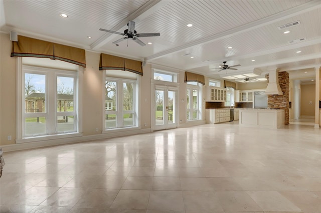 unfurnished living room with recessed lighting, a ceiling fan, visible vents, and baseboards