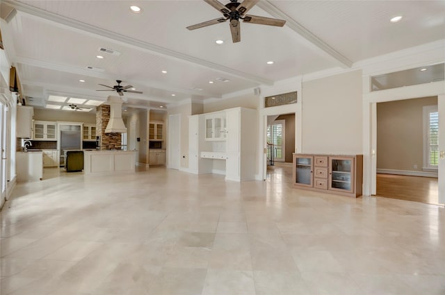 unfurnished living room with recessed lighting, visible vents, beamed ceiling, and ceiling fan