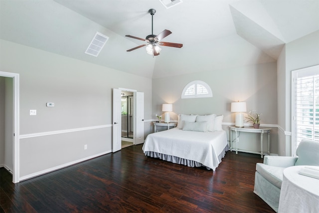 bedroom with lofted ceiling, wood finished floors, visible vents, and ceiling fan