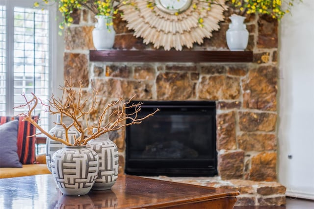 room details featuring a stone fireplace