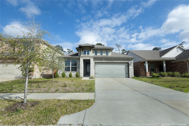 view of front of home with a garage, stone siding, a front lawn, and driveway