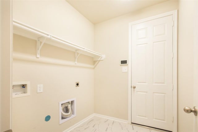 laundry area with electric dryer hookup, washer hookup, marble finish floor, baseboards, and laundry area