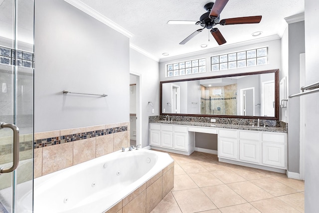 bathroom with a stall shower, a tub with jets, crown molding, double vanity, and ceiling fan