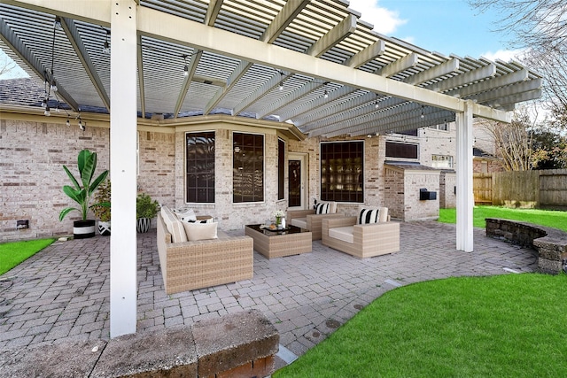 view of patio featuring fence and an outdoor hangout area