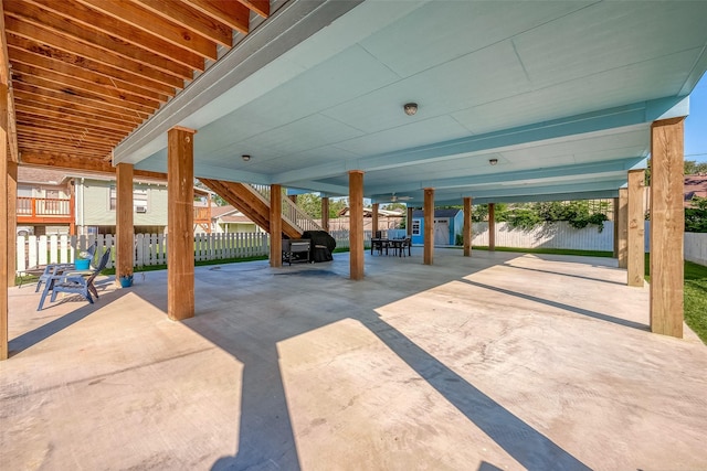 108 Bay Oaks Dr, La Porte, TX 77571 - view of patio / terrace featuring an outbuilding, a shed, stairs, and a fenced backyard