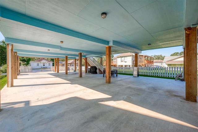108 Bay Oaks Dr, La Porte, TX 77571 - view of patio / terrace with a carport, stairs, and fence