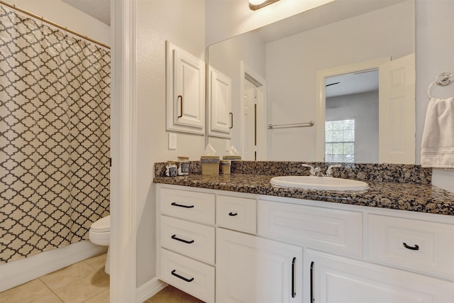 full bathroom featuring curtained shower, toilet, vanity, and tile patterned flooring