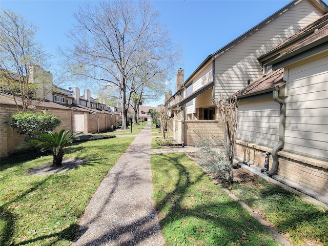 exterior space with fence and a residential view