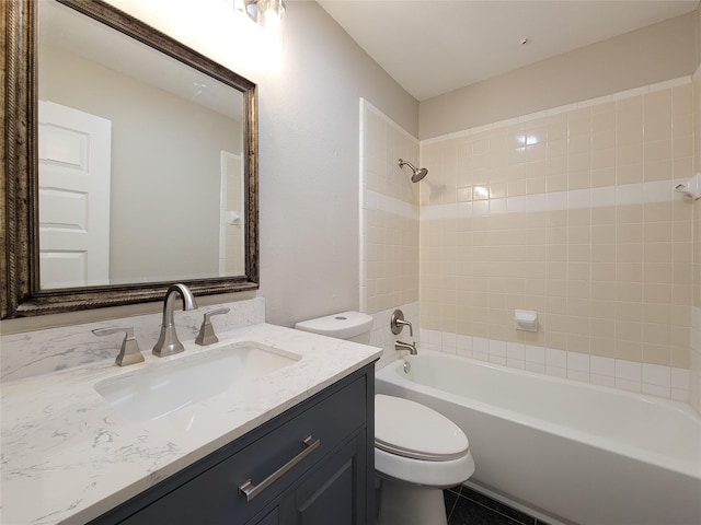 full bath featuring shower / bathing tub combination, toilet, and vanity