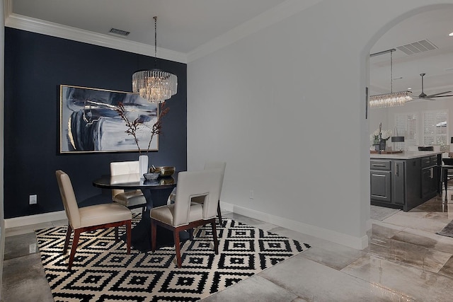 dining space featuring visible vents, baseboards, ornamental molding, arched walkways, and marble finish floor