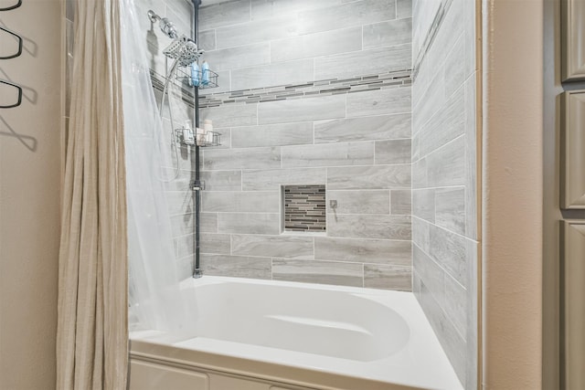 bathroom featuring shower / bathtub combination with curtain