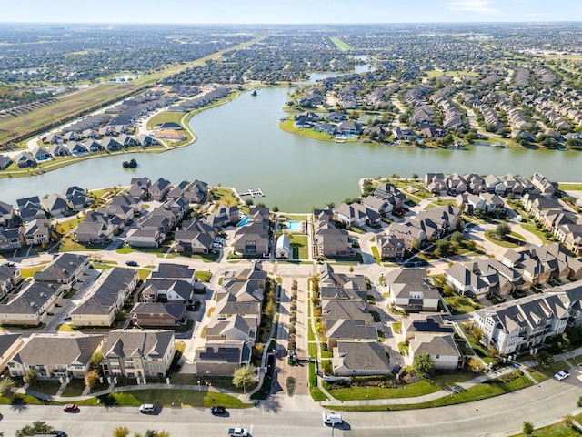 aerial view featuring a residential view and a water view