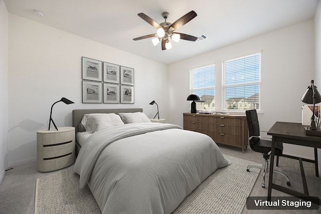 bedroom featuring visible vents, light colored carpet, baseboards, and ceiling fan