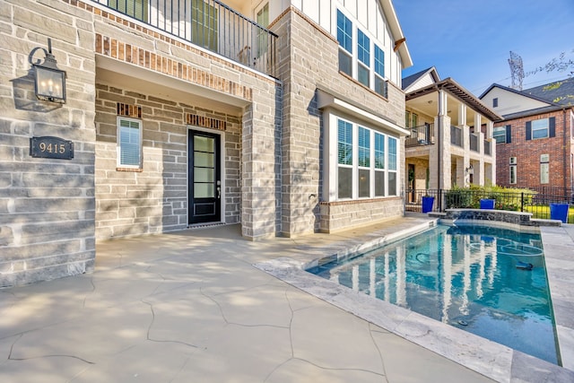 view of swimming pool with a fenced in pool, a patio, and fence