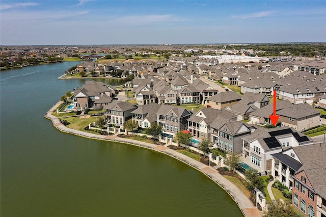 aerial view with a residential view and a water view