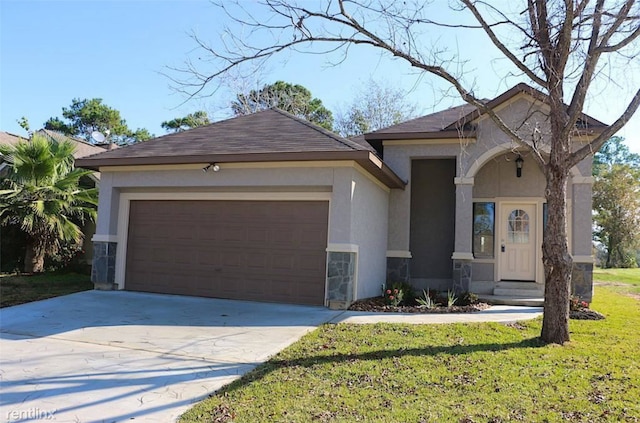 view of front facade featuring a front lawn, stone siding, driveway, and stucco siding