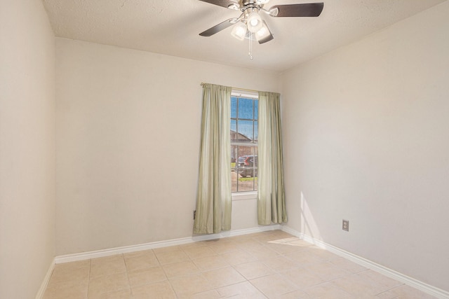 13930 Bonnercrest Dr, Houston, TX 77083 - unfurnished room with ceiling fan, light tile patterned floors, baseboards, and a textured ceiling