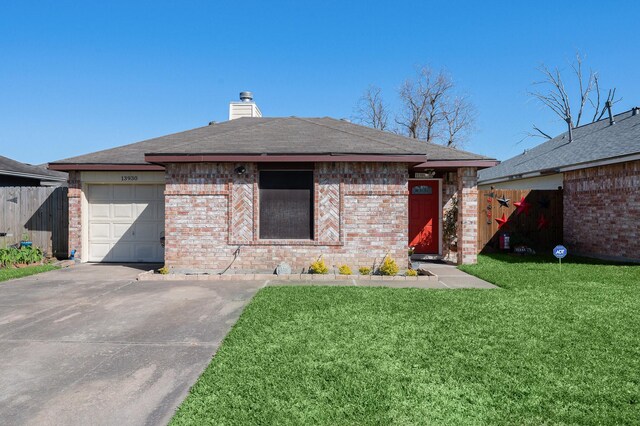 single story home with brick siding, fence, a front yard, a chimney, and a garage