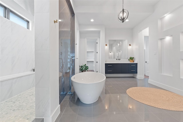 full bathroom with vanity, a soaking tub, recessed lighting, a walk in shower, and tile patterned floors