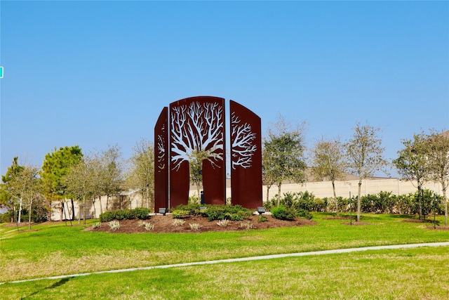 exterior space with a barn, an outdoor structure, and a yard