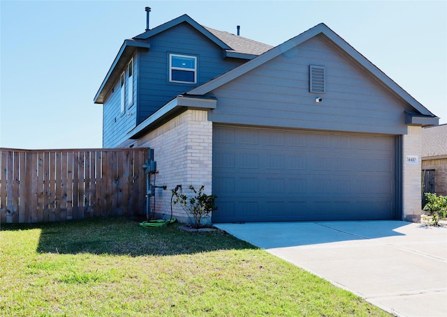 view of front of property featuring driveway, brick siding, a front lawn, and fence