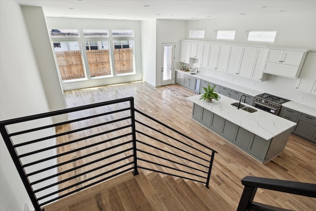 staircase with wood finished floors