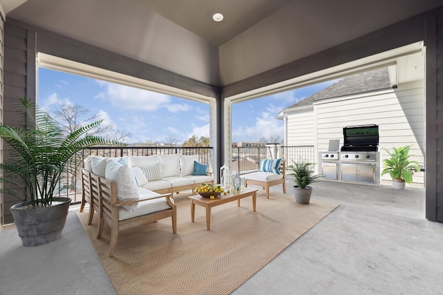 view of patio / terrace with an outdoor living space and a grill