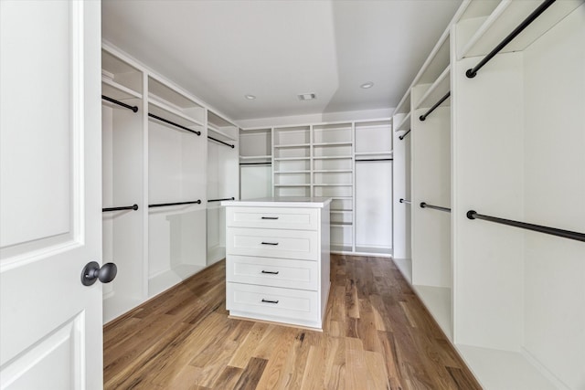 walk in closet featuring visible vents and light wood-style floors