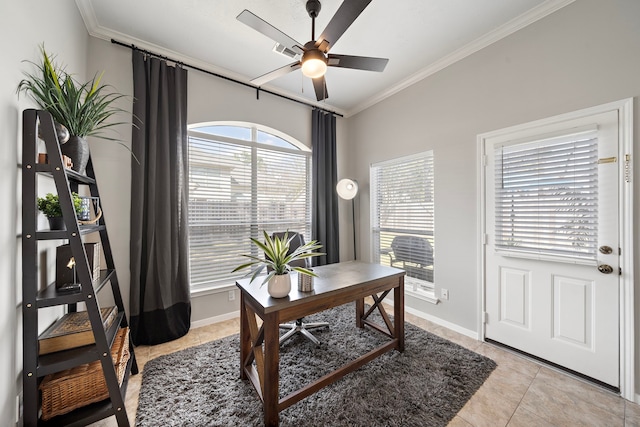 office space with light tile patterned floors, baseboards, ornamental molding, and a ceiling fan