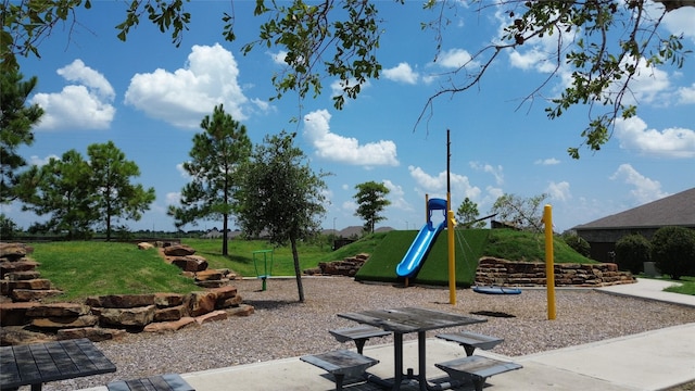 community playground featuring a lawn