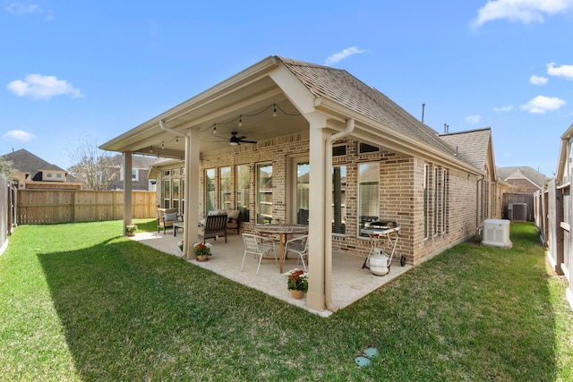 view of patio / terrace with a fenced backyard and ceiling fan