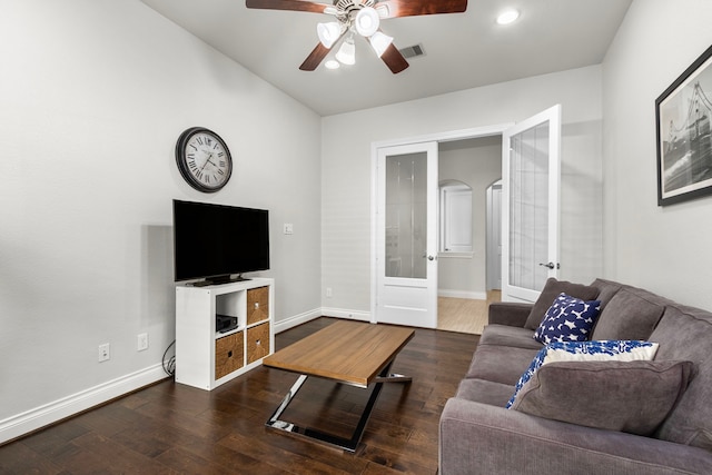 living room featuring french doors, baseboards, a ceiling fan, and hardwood / wood-style flooring