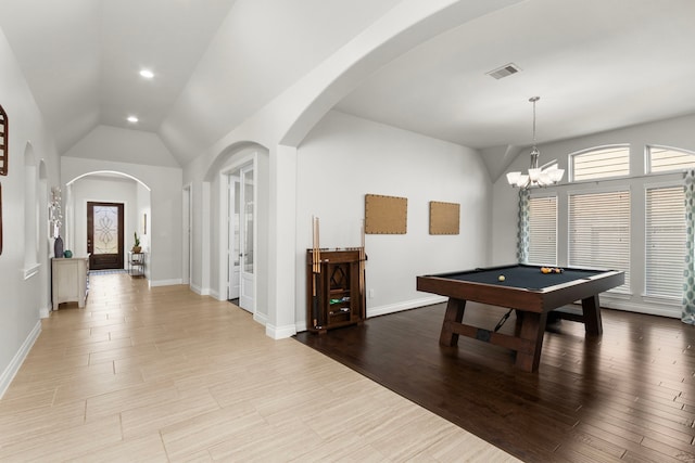 recreation room featuring visible vents, wood finished floors, pool table, baseboards, and vaulted ceiling