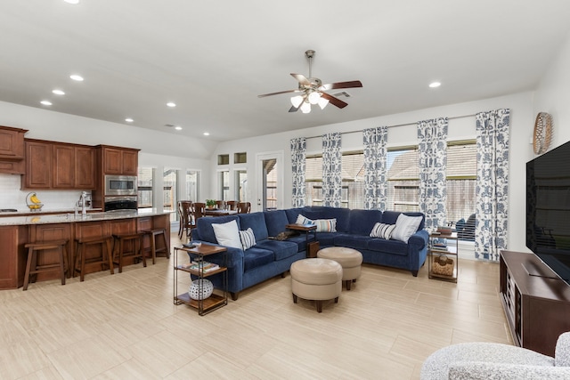 living room with recessed lighting and ceiling fan