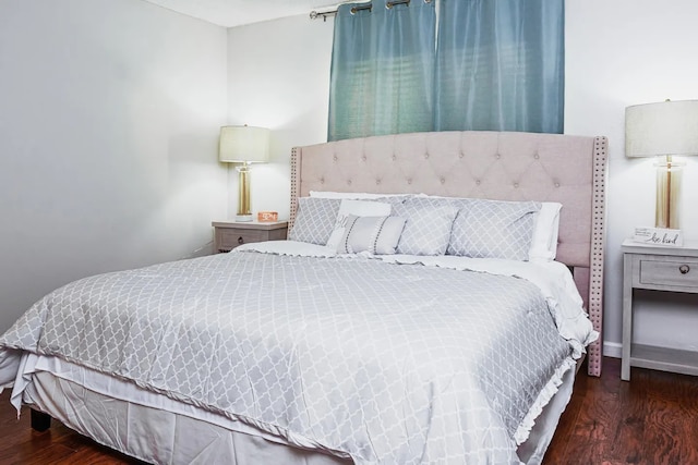 bedroom with wood finished floors