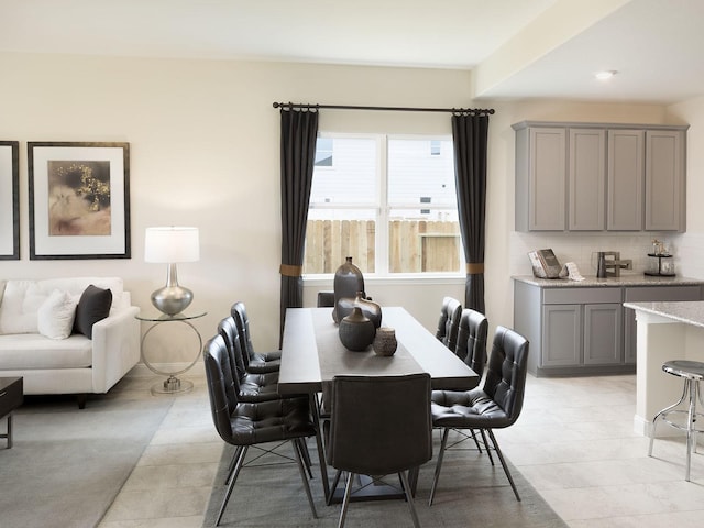 dining room featuring baseboards